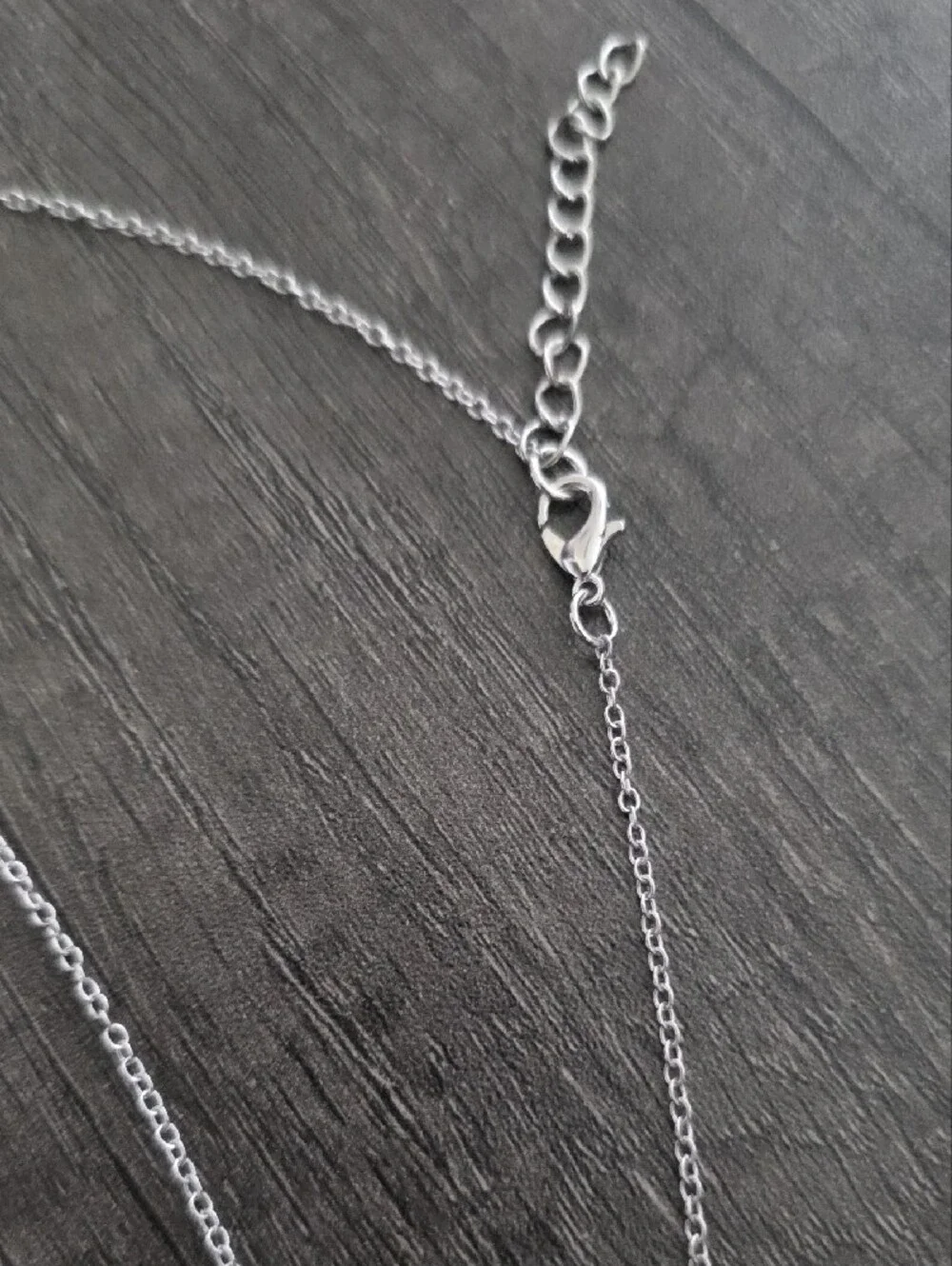 Silver Cross Pendant Necklace with Blue Crystal Accents